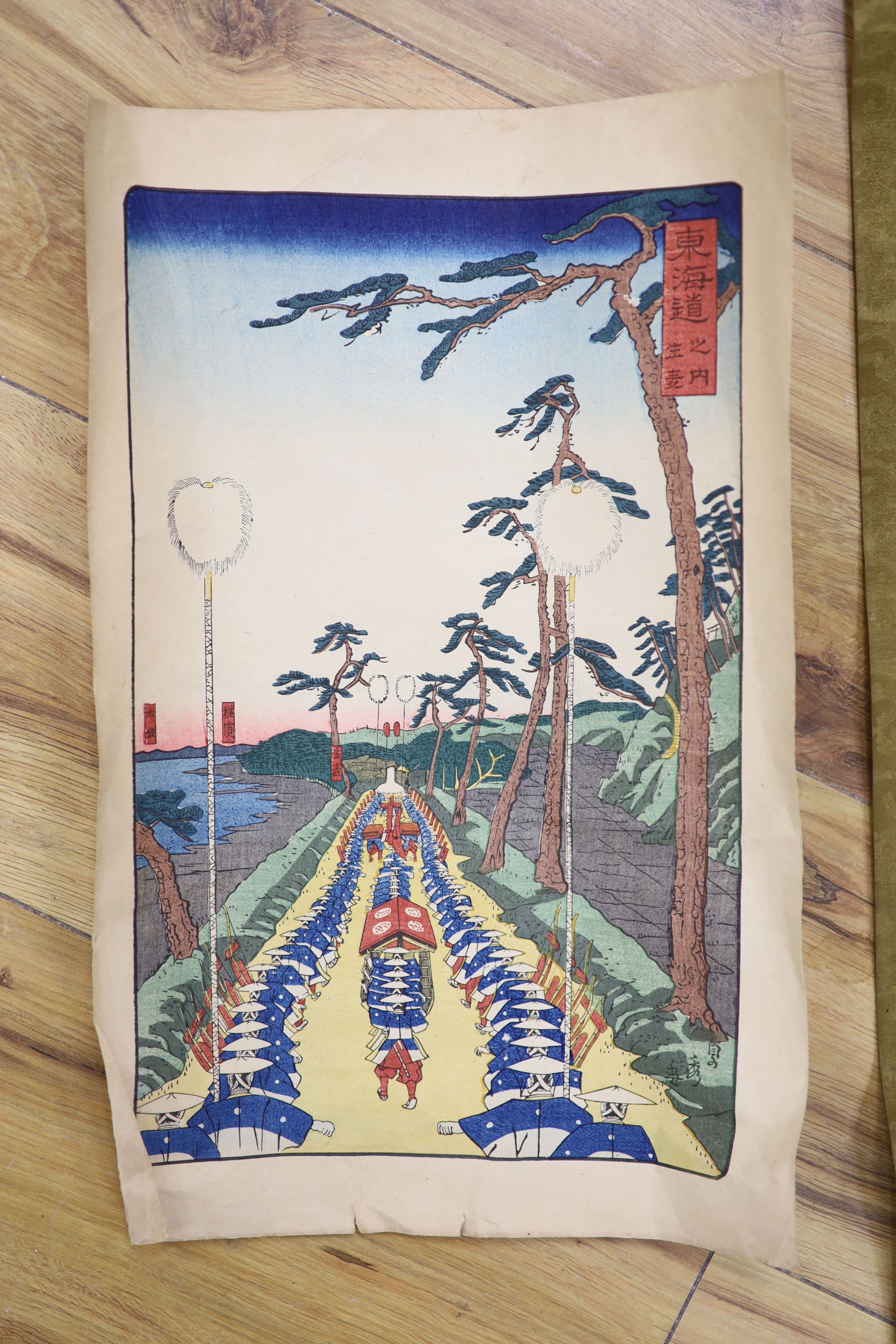 A watercolour on silk scroll painting and three unframed woodblock prints